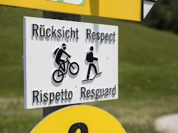 a white sign with black lettering on it