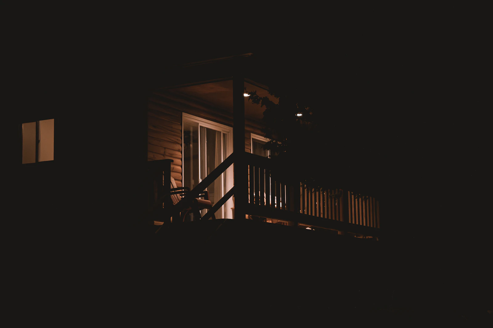A dark front porch at night
