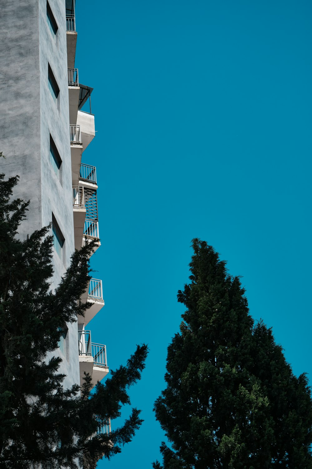 a tall building with balconies and balconies on the balconies