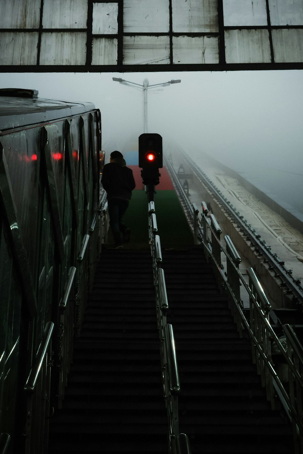 a couple of people that are walking up some stairs