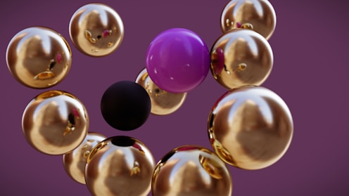 a group of balloons floating in the air