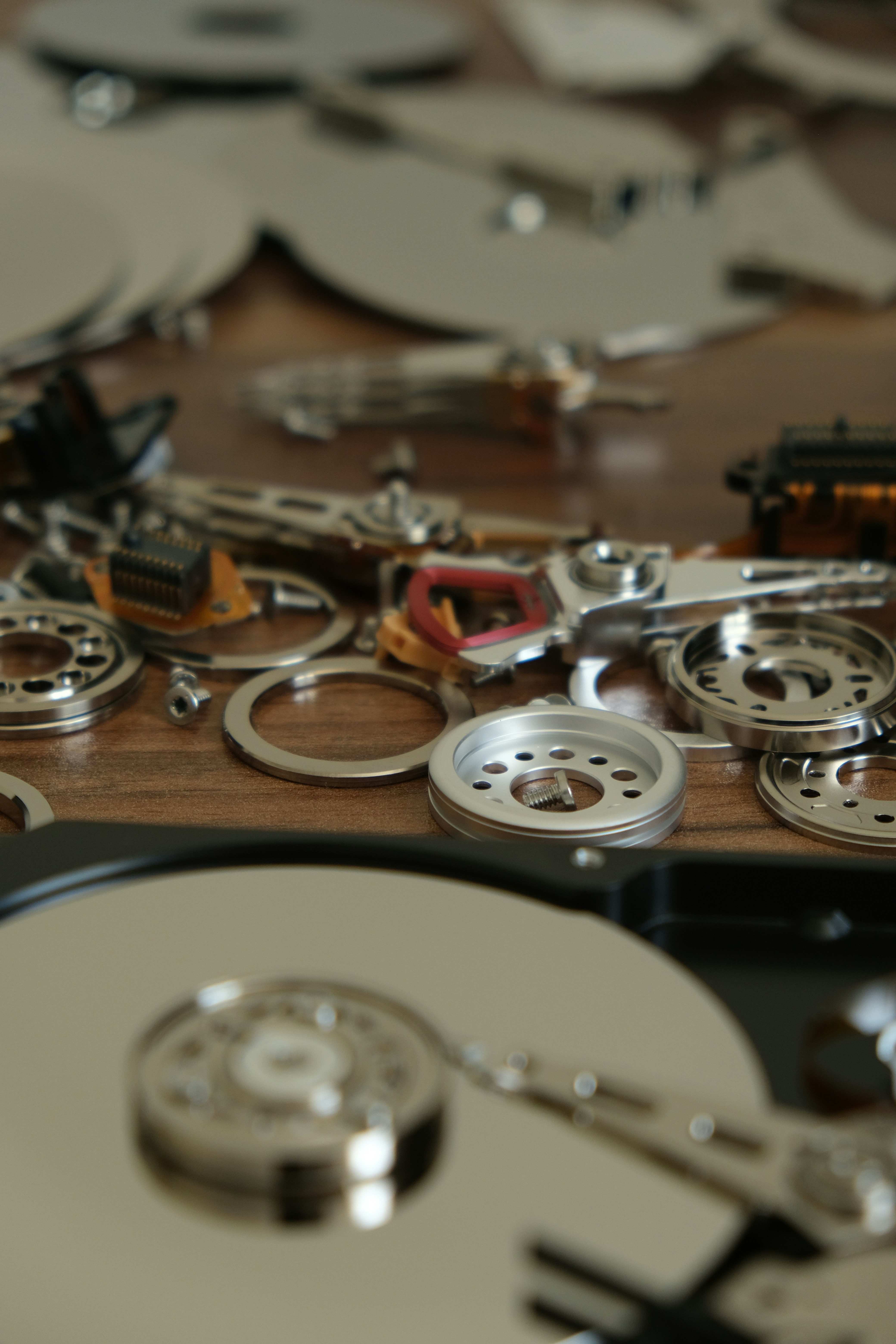 a table topped with lots of different types of discs