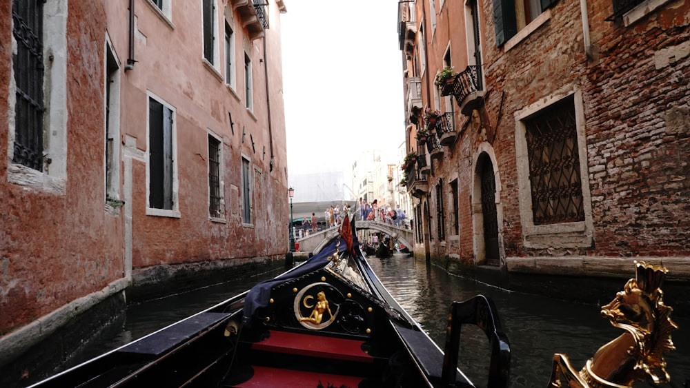 a gondola in a narrow canal in venice