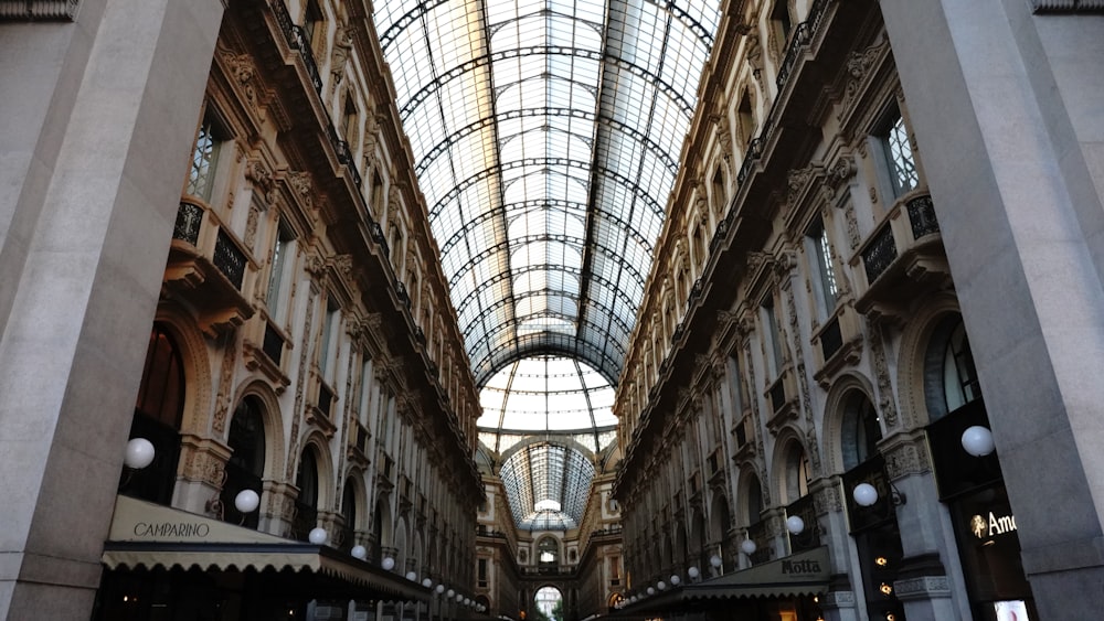 a view of an indoor shopping mall from the ground