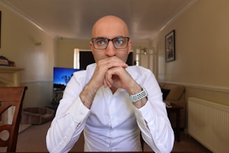 A technician carefully fixing a cracked TV screen in a cozy living room.