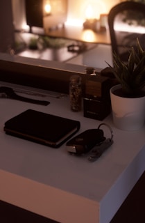 A welcoming office desk with a phone, notebook, and a small plant, symbolizing approachable customer service.