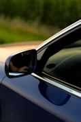 a close up of a car's side view mirror