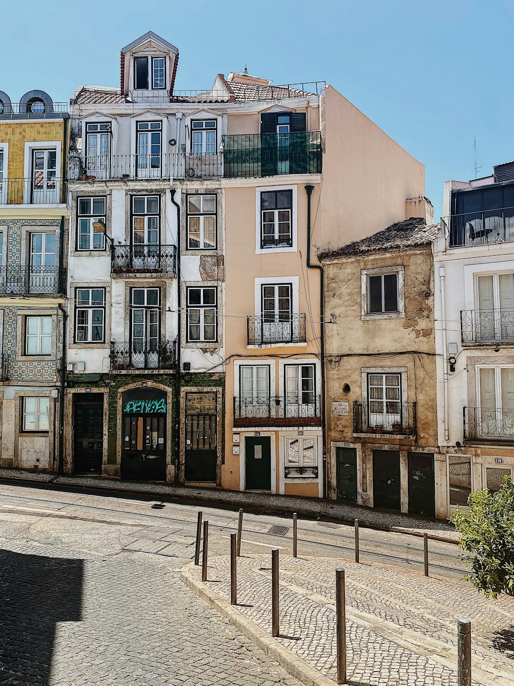 a row of buildings with balconies and balconies on top of them