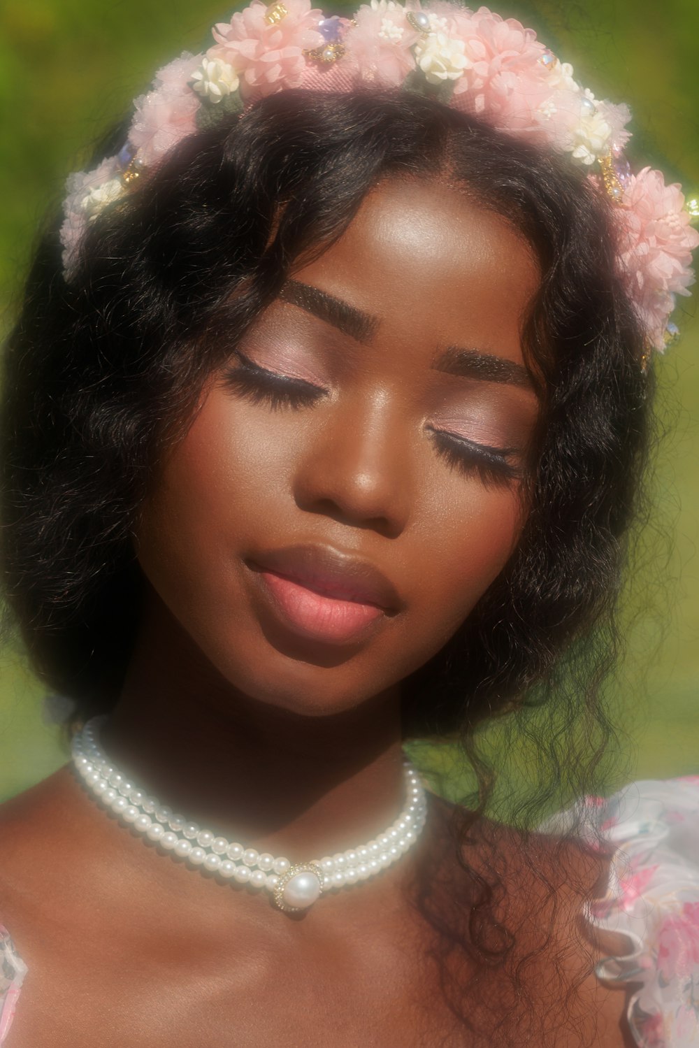 a woman with a flower crown on her head