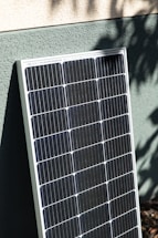 a solar panel mounted to the side of a building