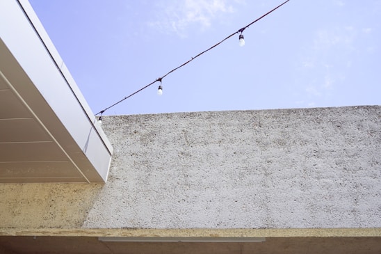 Minimalist elegant canopy installation on a modern home exterior