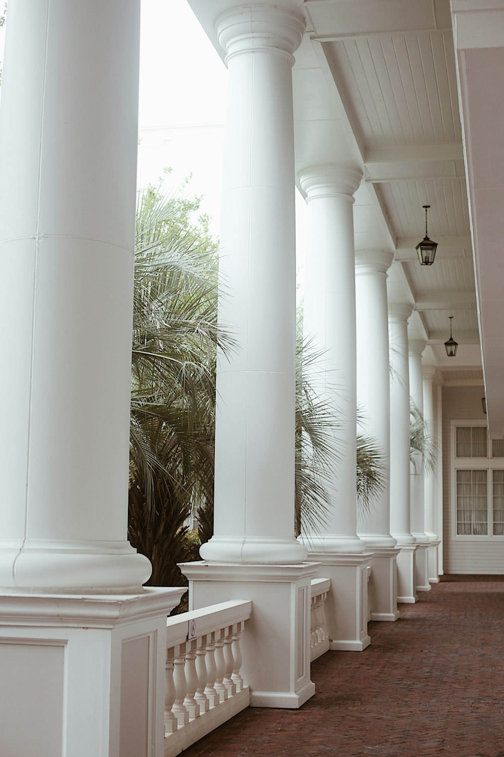 a row of white pillars sitting next to each other