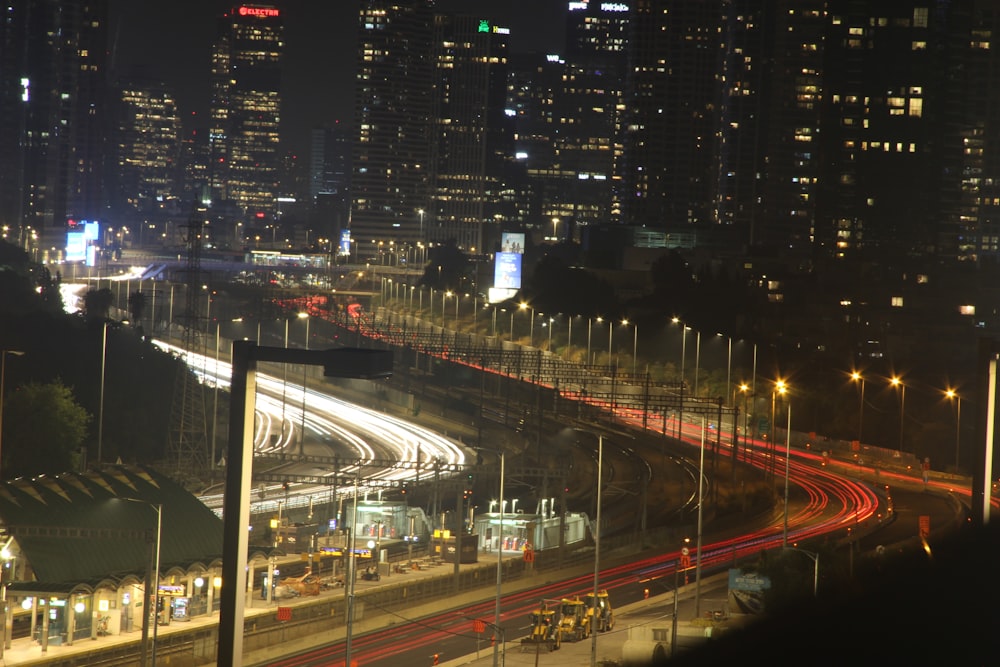 a city at night with a lot of traffic