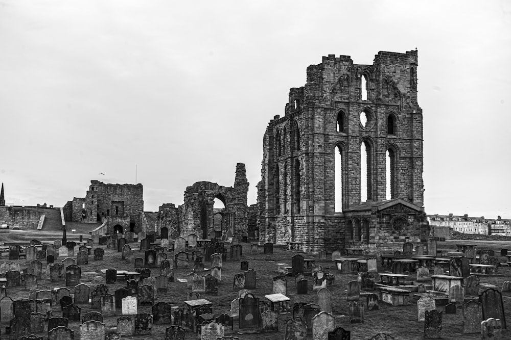 a black and white photo of a graveyard