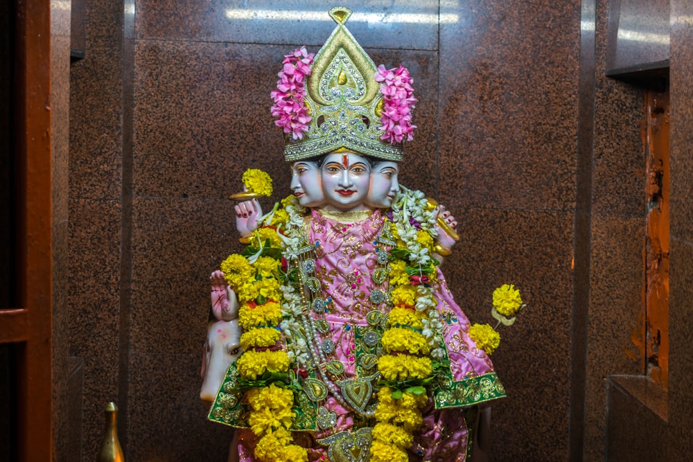 a statue of a hindu god in a temple