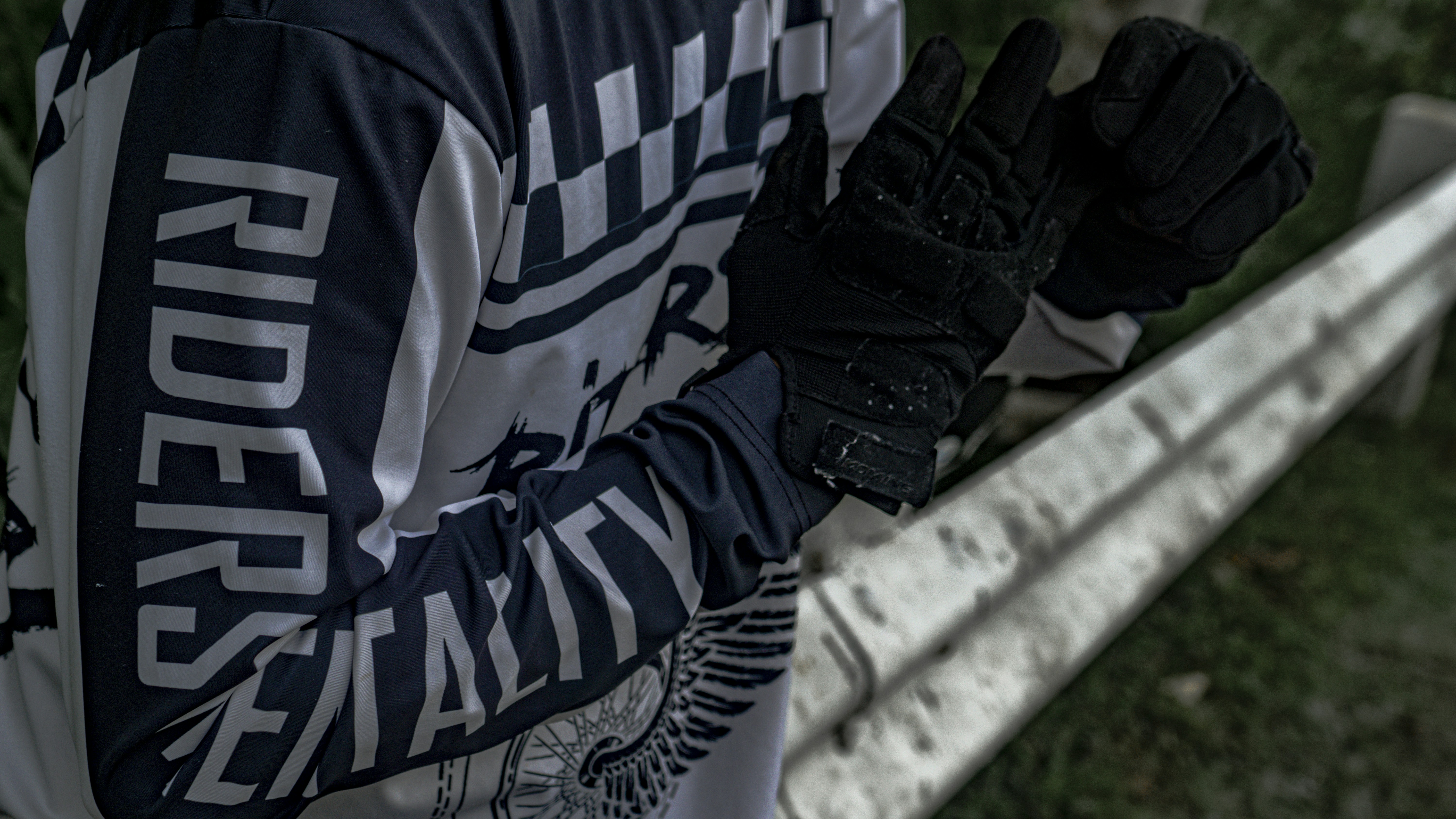 a baseball player wearing a catchers mitt on a field