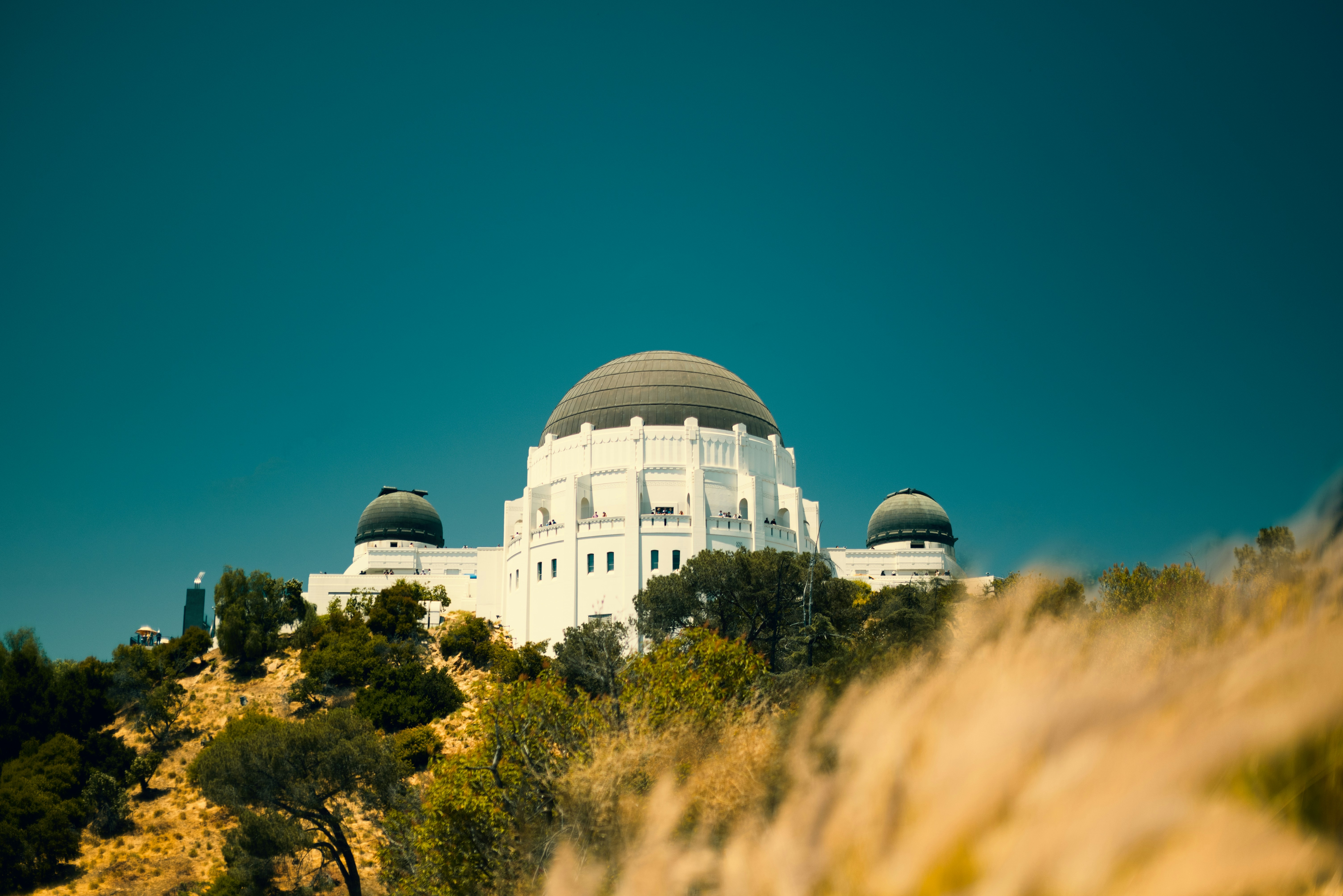a white building on top of a hill