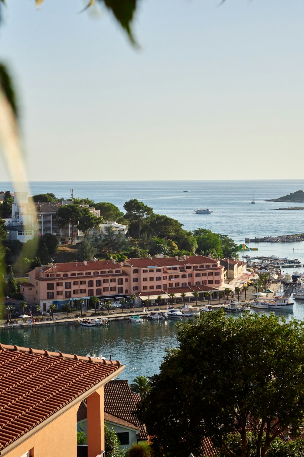 a view of a harbor with boats in the water