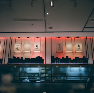 Warm interior of Kahing Chinese Restaurant with a bustling kitchen and smiling staff