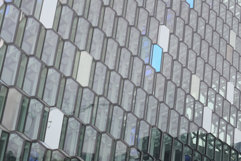 a very tall building with many windows and a clock