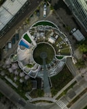 an aerial view of a circular building in a city
