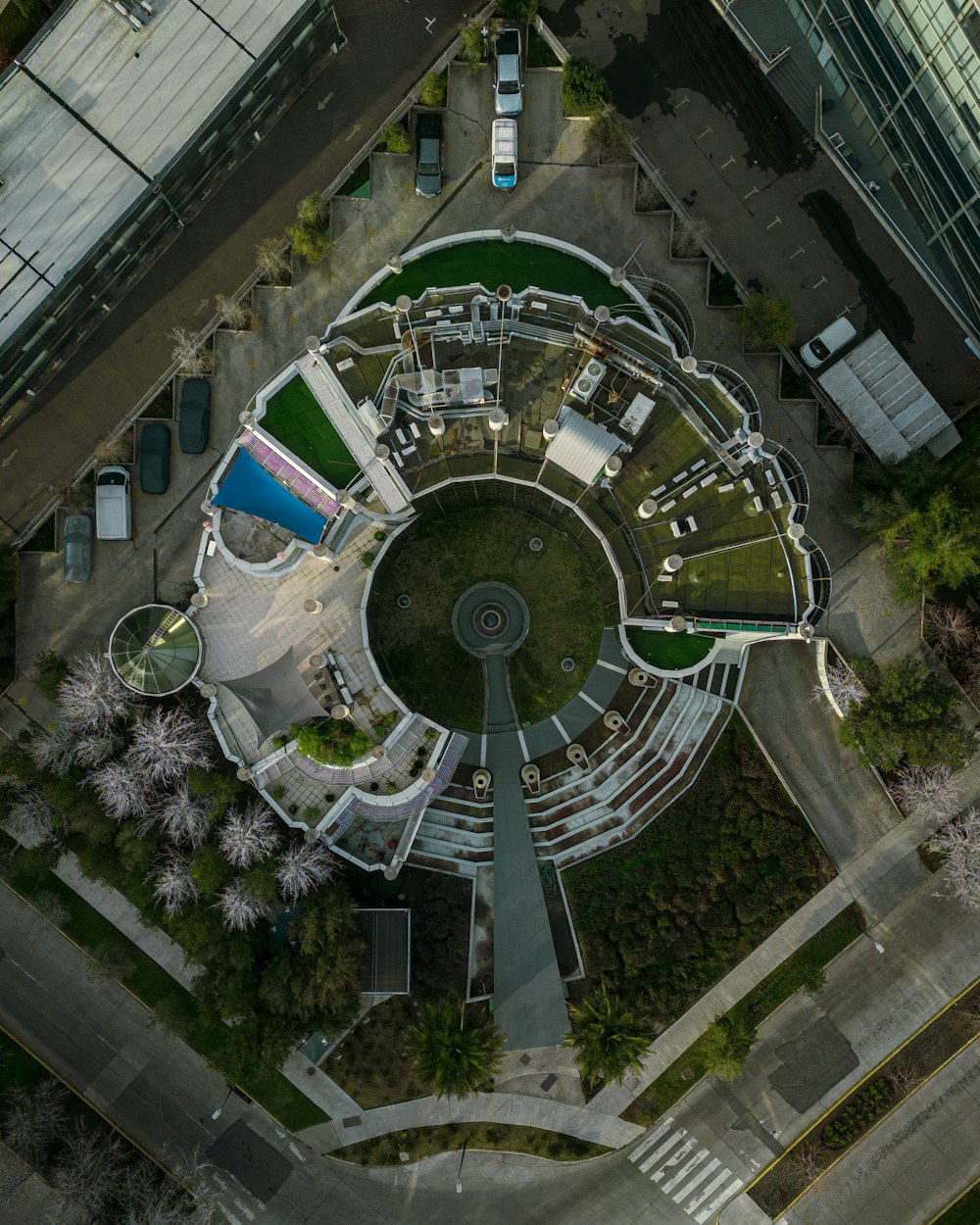 an aerial view of a circular building in a city