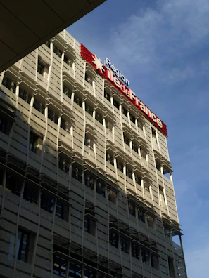 Sunlit exterior view of the Casamo Médical association building in Nanterre.
