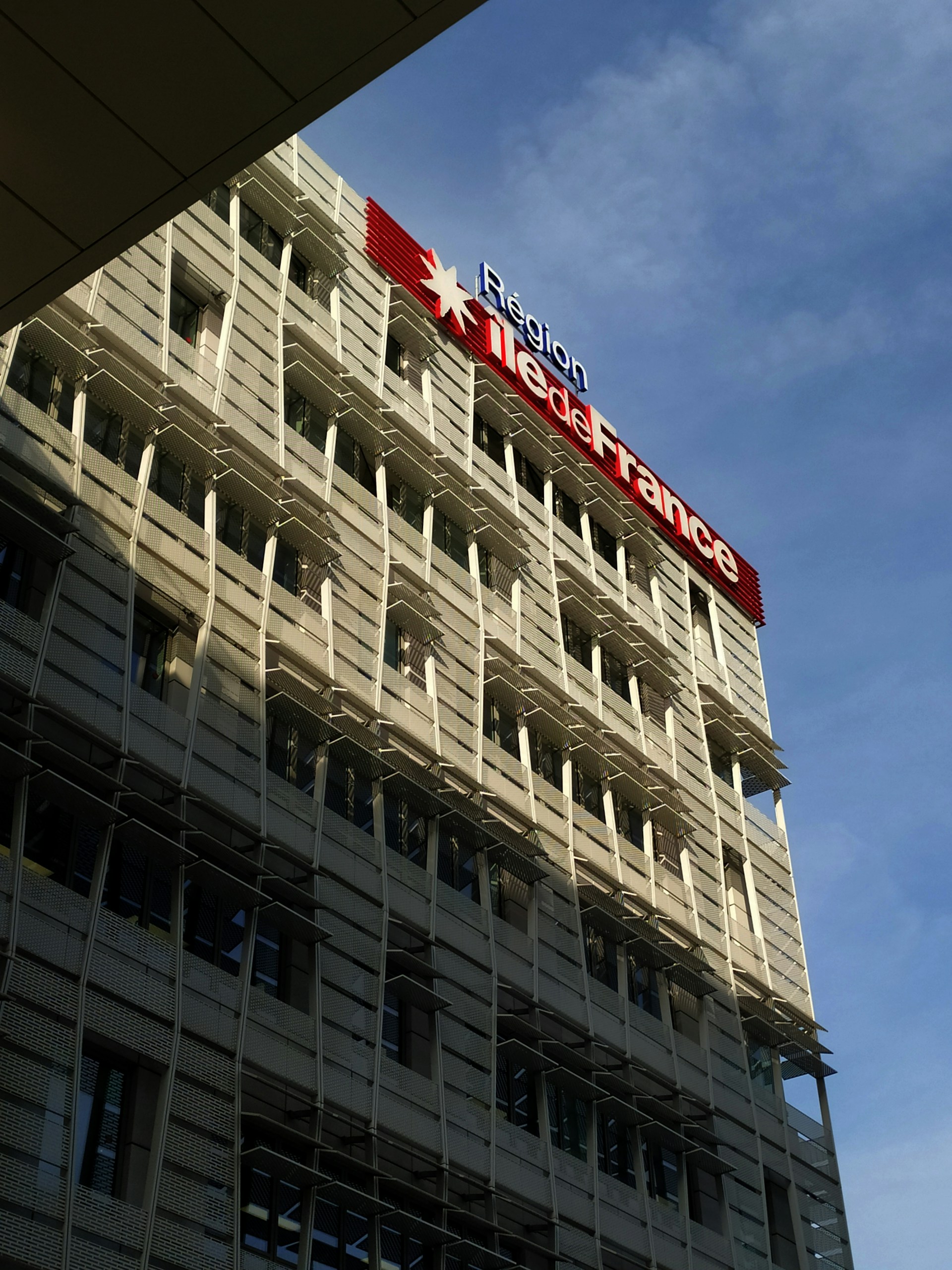 woman wearing yellow long-sleeved dress under white clouds and blue sky during daytime