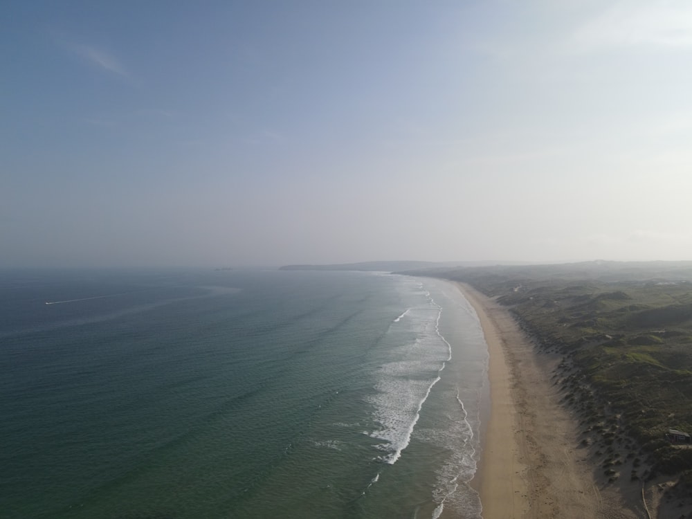 an aerial view of a beach and the ocean