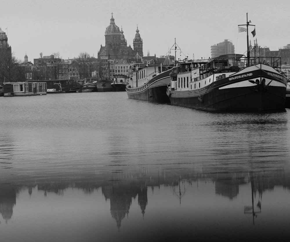 a black and white photo of a boat in the water