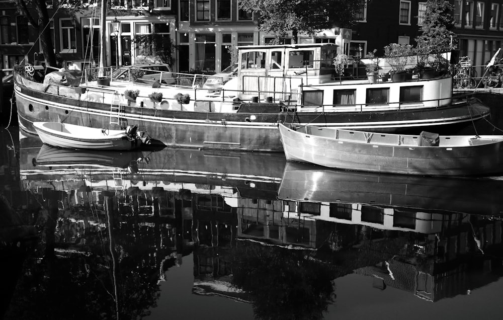 a couple of boats that are sitting in the water