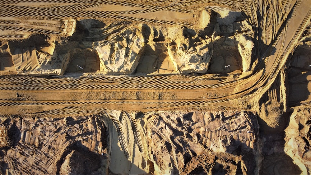 an aerial view of a road in the desert