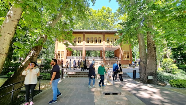 Group of happy travelers exploring the lush greenery of a João Pessoa park