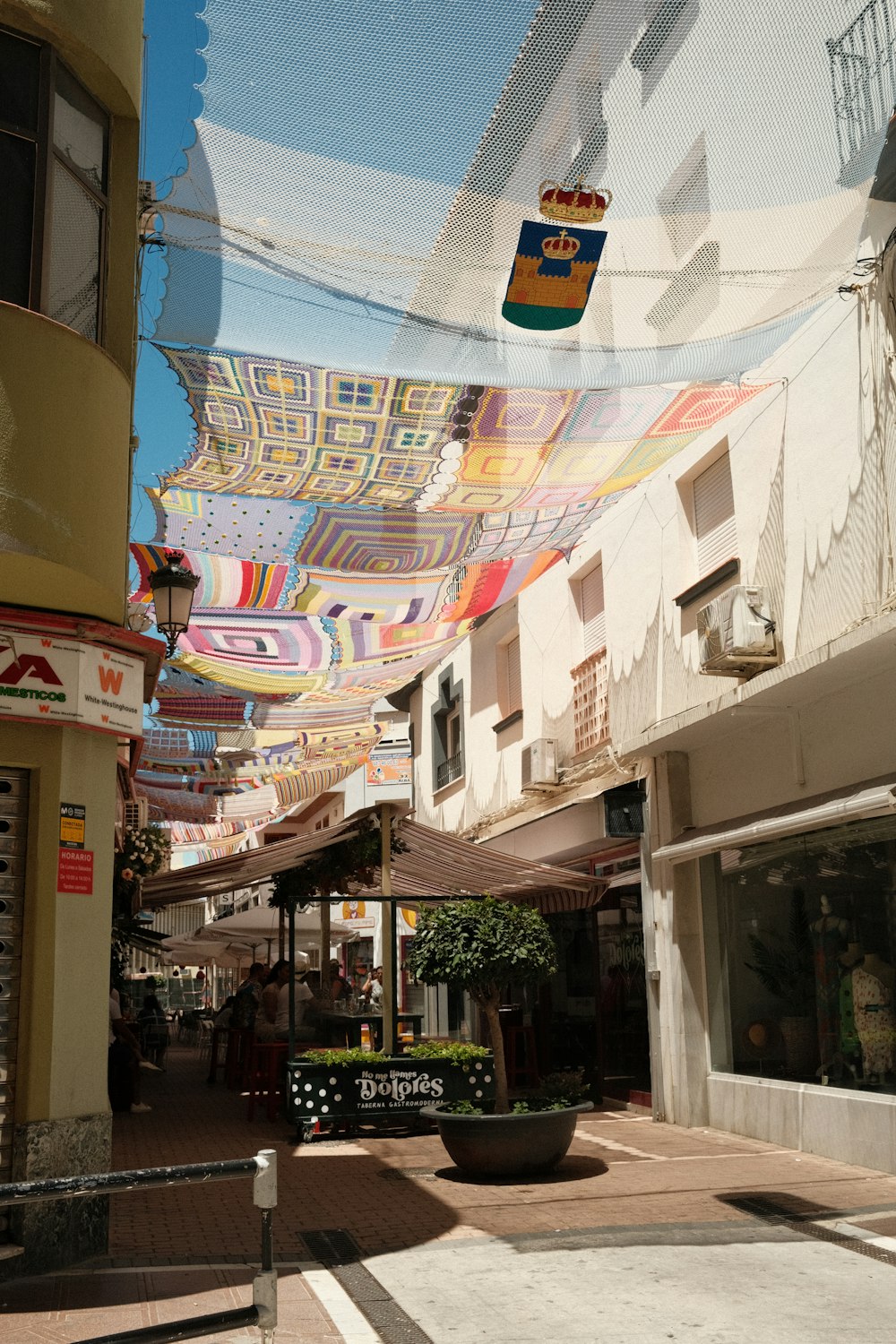 a view of a city street with a lot of buildings