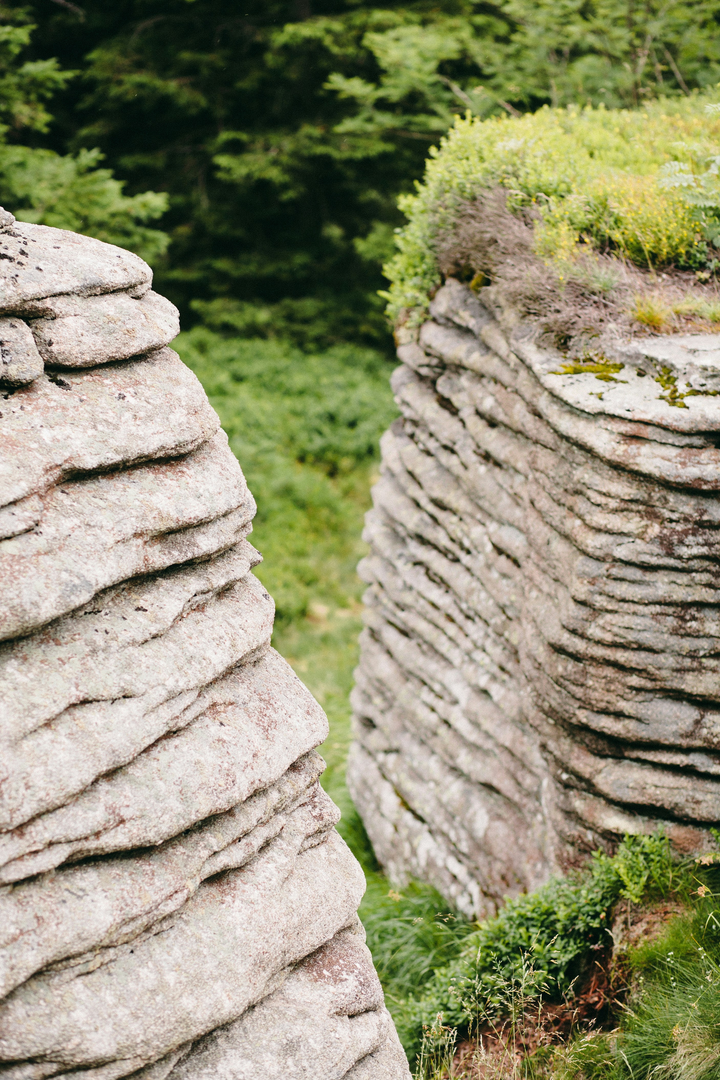 a couple of large rocks sitting next to each other