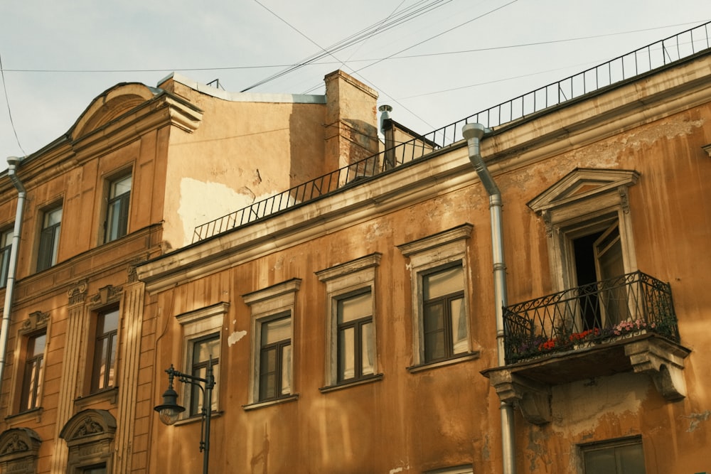 an old building with a balcony and balconies