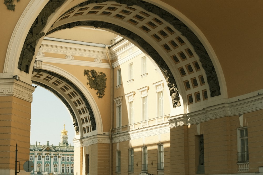 an arch in a building with a clock on it