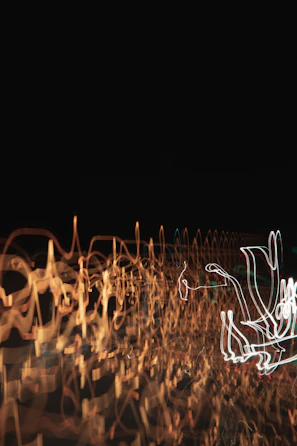Detail of an abstract artwork featuring glowing light patterns and textures.