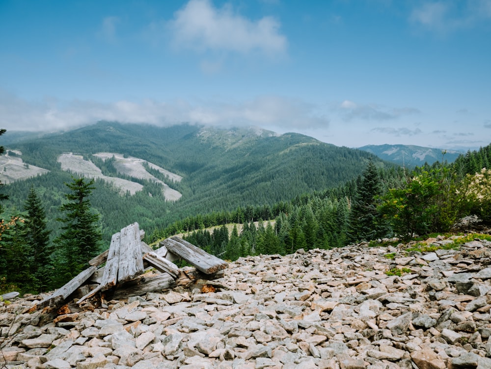 a pile of rocks on top of a mountain