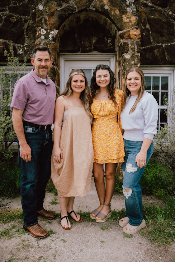 a group of people standing next to each other