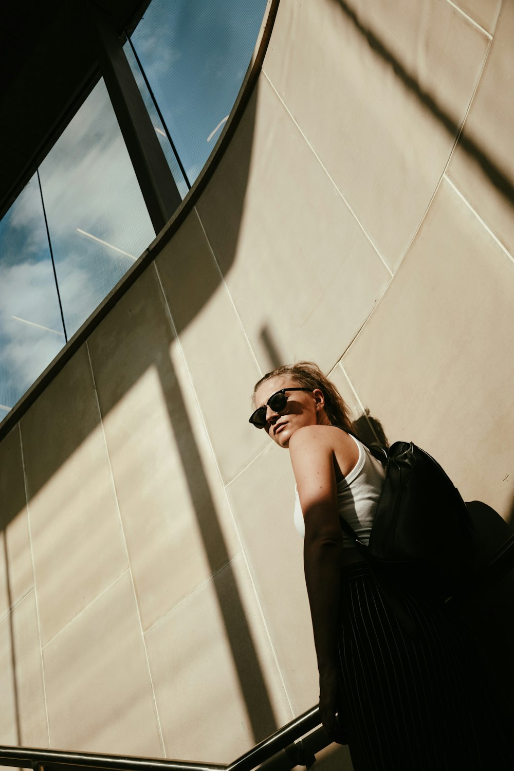 a woman walking down a flight of stairs