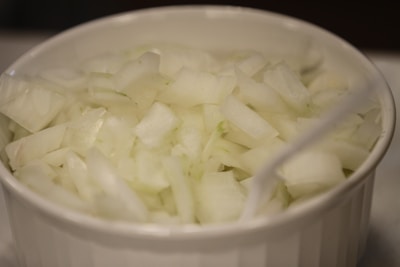 Fresh onions being processed in a clean, modern facility.