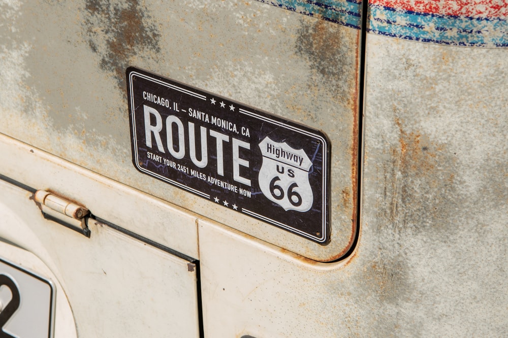 a route 66 sign on the side of a car