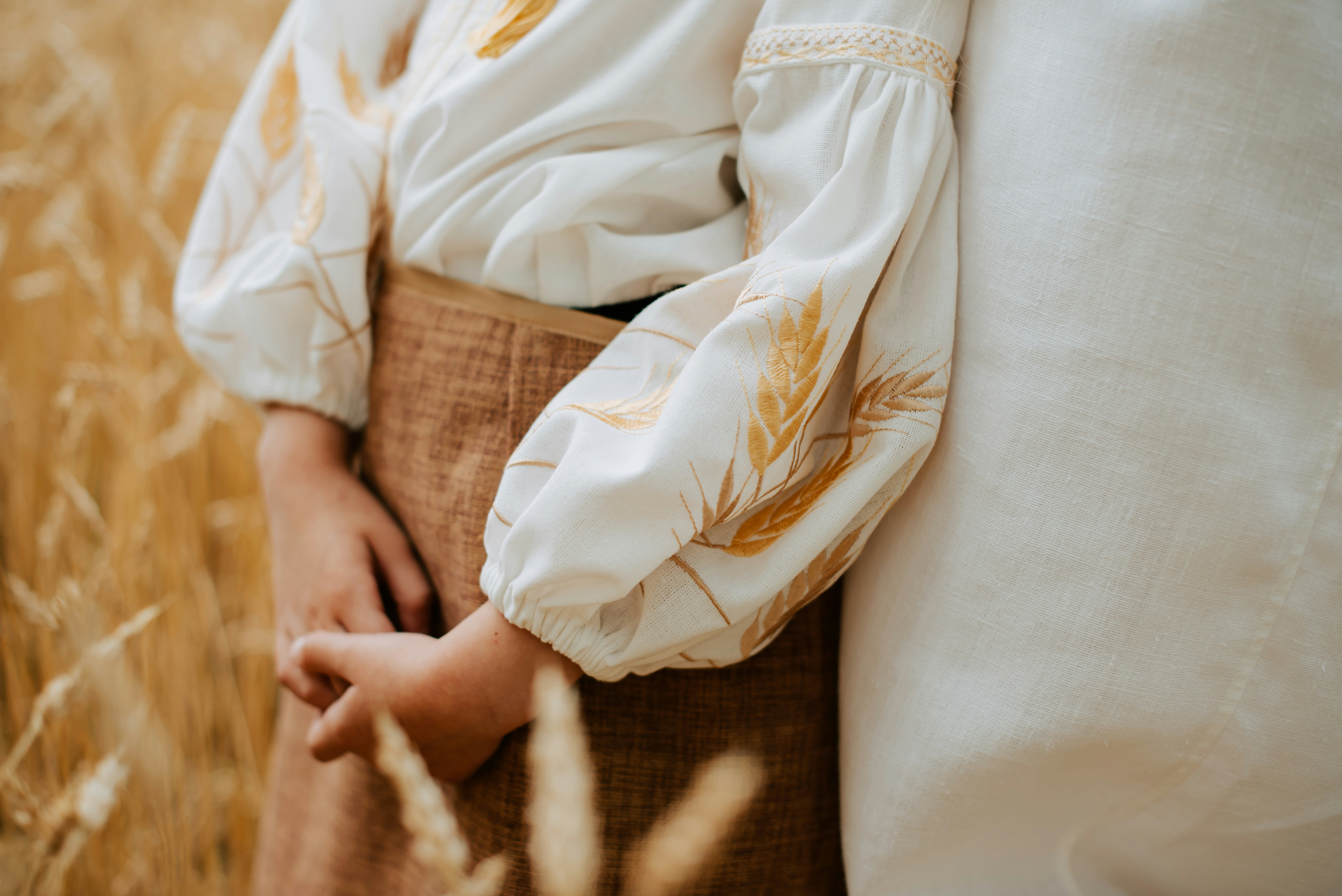 a close up of a person standing in a field