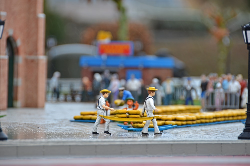 a couple of figurines that are on a table