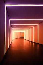a long hallway with a lot of lights in it