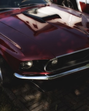 A beautifully restored classic car with a glossy finish.