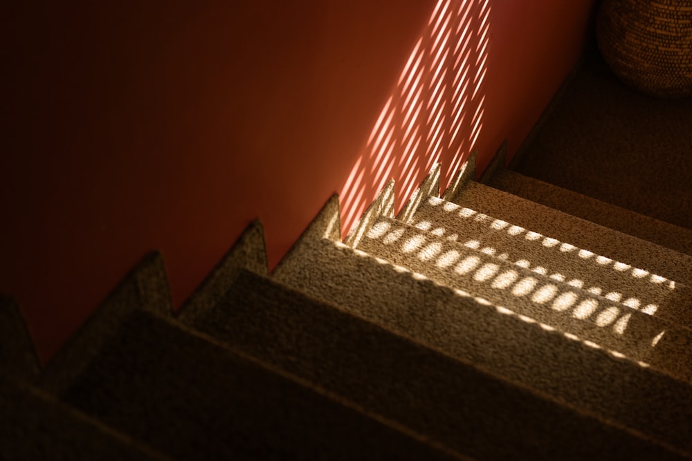 a stair case with a light shining through it