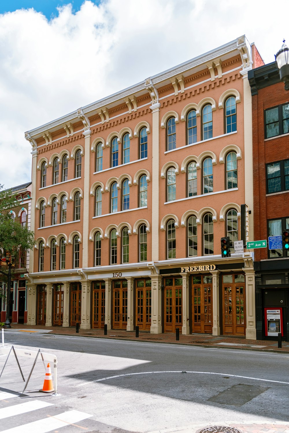 a large brick building on a city street