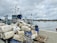 A satisfied customer receiving supplies from Pacific Anchor Marine Services.